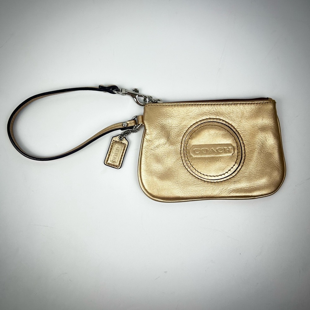 COACH Metallic Gold Leather Wristlet with Logo Medallion